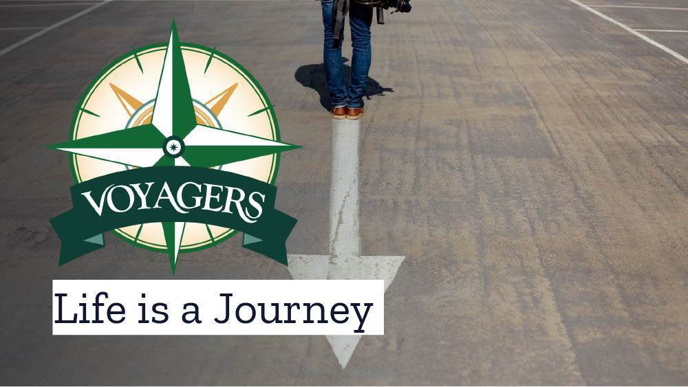Legs on a road with Compass Logo reading Life is a Journey